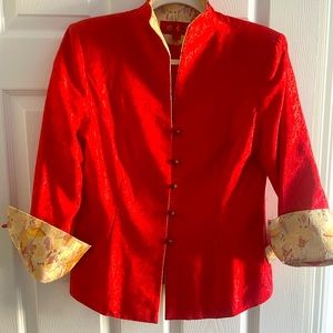 Elegant Chinese mock neck jacket with exquisite button and sleeve detail